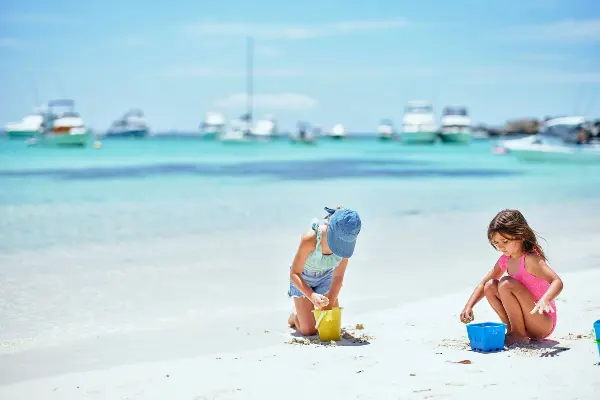 Kids playing in sand at Longreach Bay