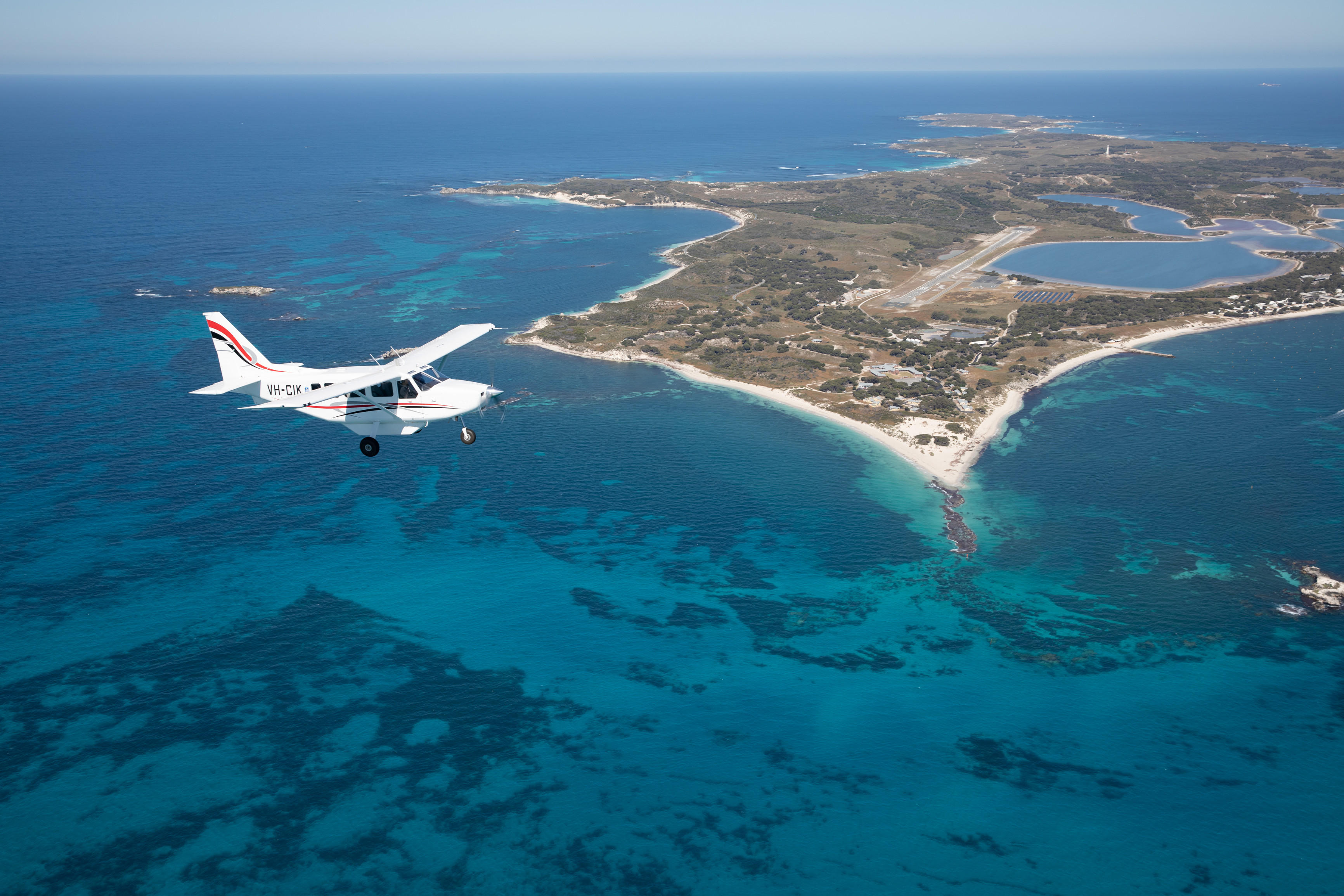 Plane flying above the island