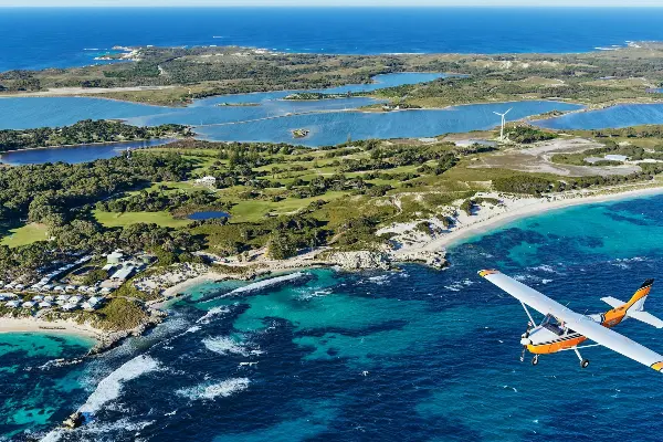Rottnest Air-Taxi flying over the pristine lakes of the island.