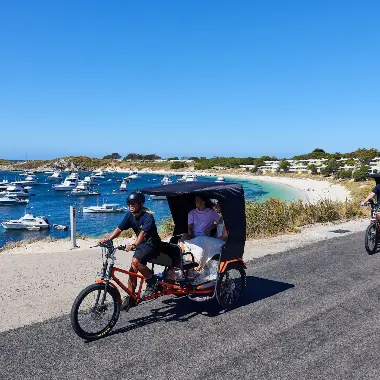 Two rickshaws riding along Geordie Bay