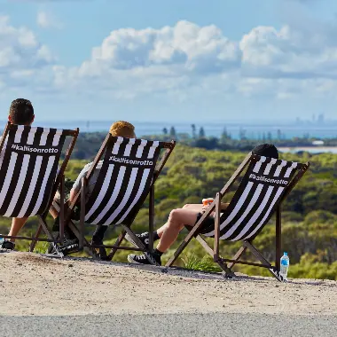 Three people in deckchairs at Kallis on Rotto