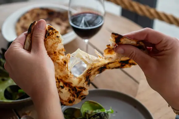 Dip flatbread into the coconut green curry